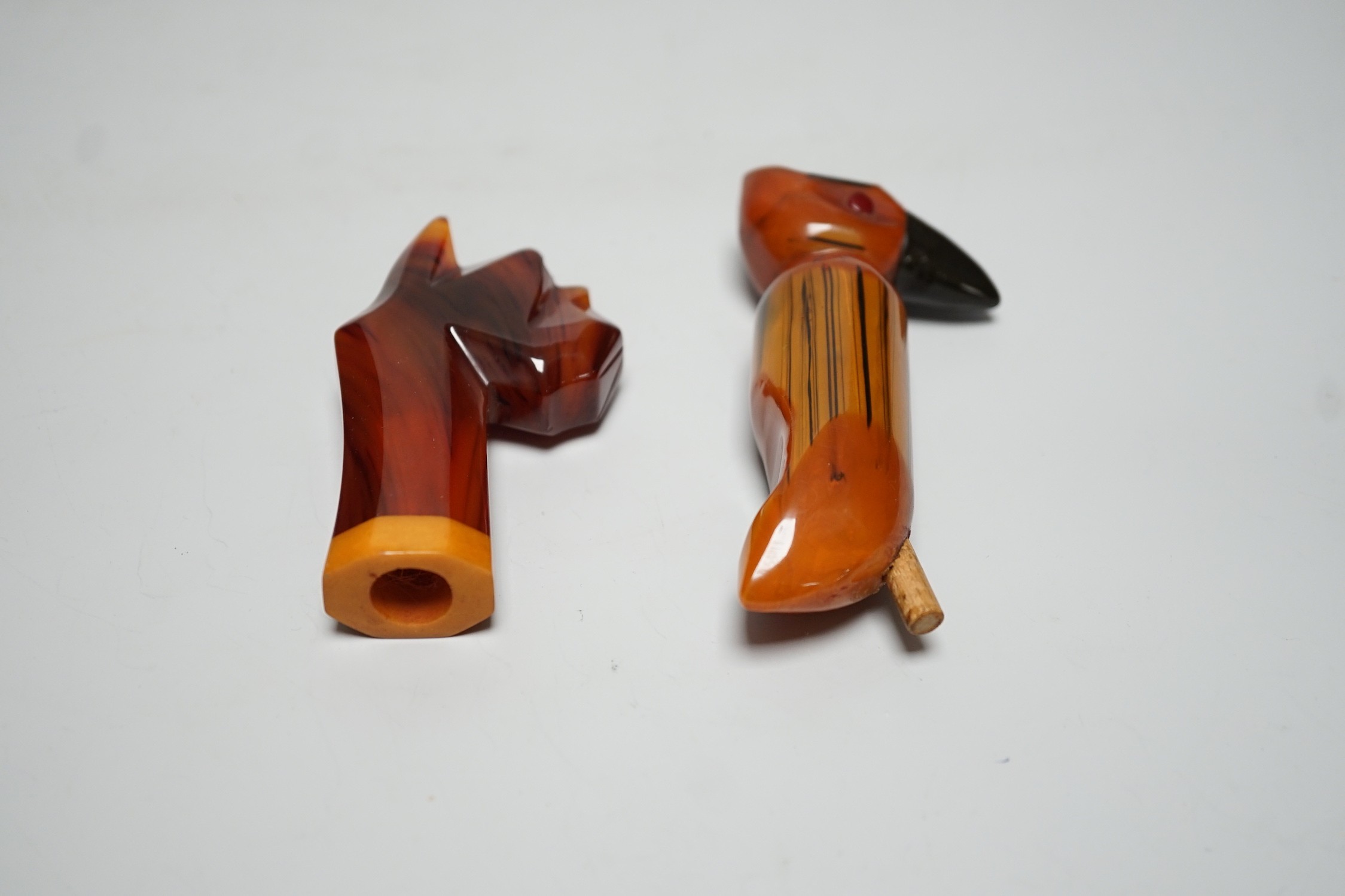 Two butterscotch amber phenolic Bakelite umbrella handles